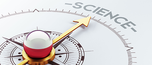 Auf dem Bild ist ein Kompass zu sehen, der auf den Schriftzug Science zeigt.